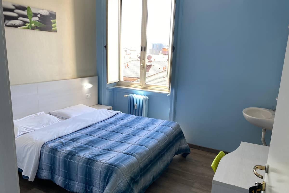 Habitación doble, baño compartido | Sábanas de algodón egipcio y decoración personalizada