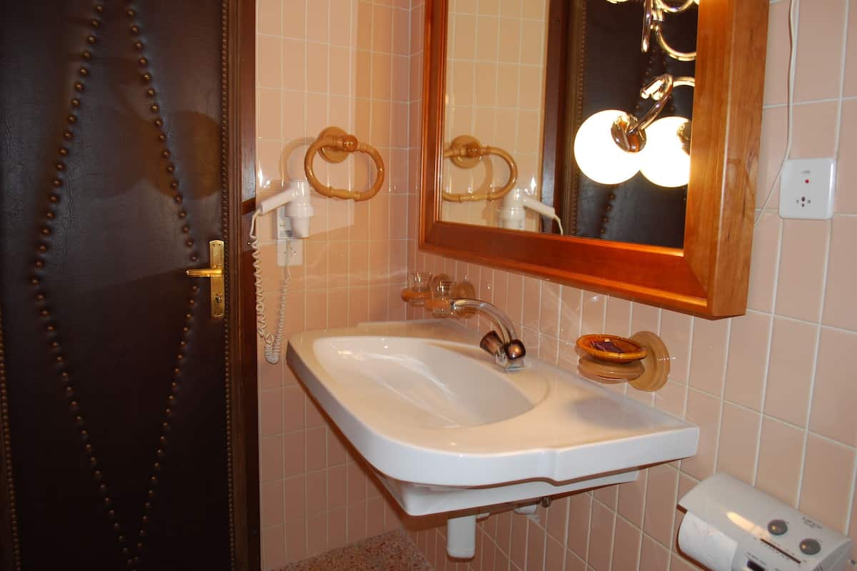 free toiletries, hair dryer, slippers, towels