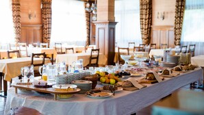 A breakfast buffet with various food items and beverages. - Astoria (Leukerbad)