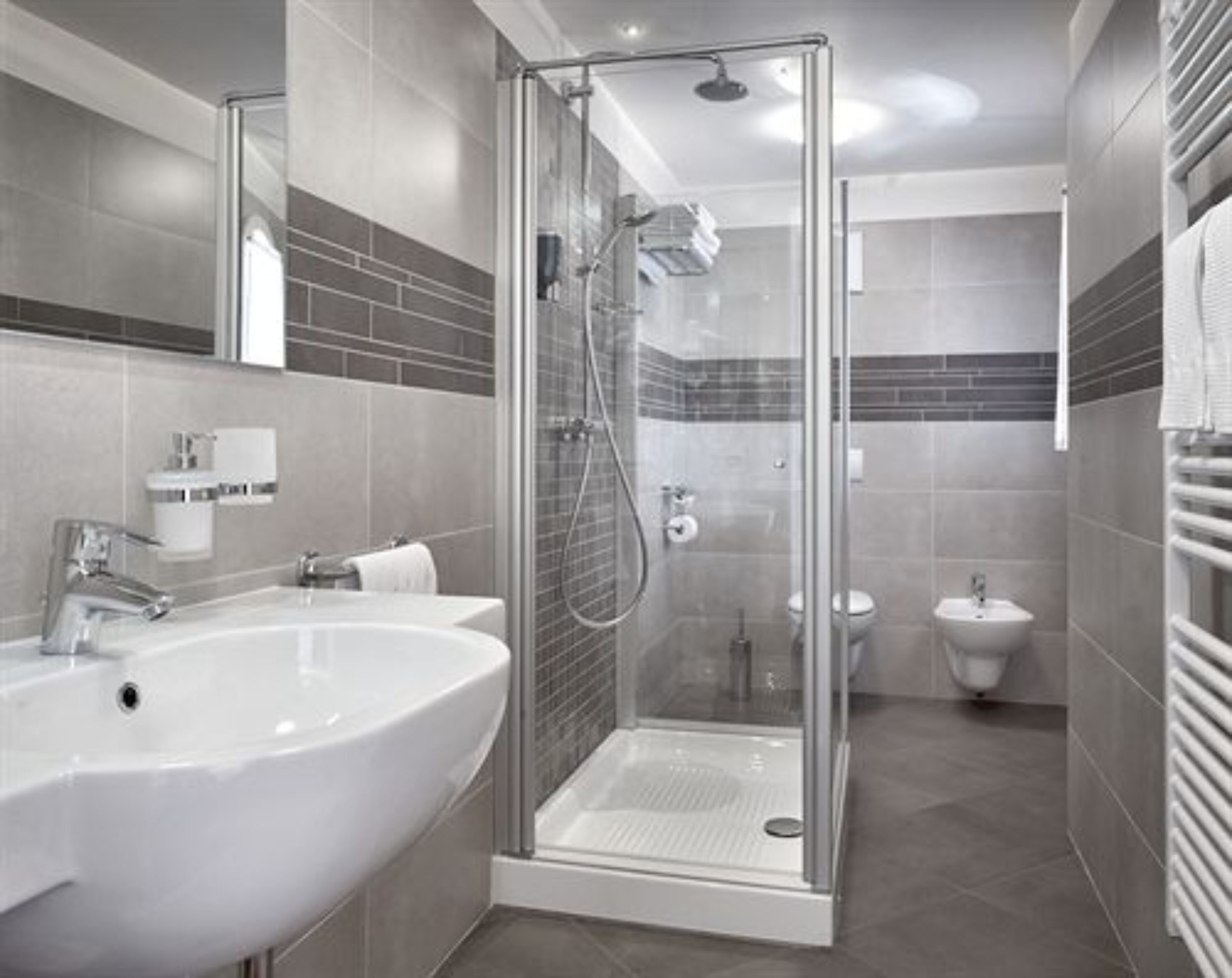 rainfall showerhead, hair dryer, bidet, towels