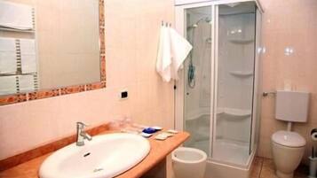 Shower, free toiletries, hair dryer, slippers