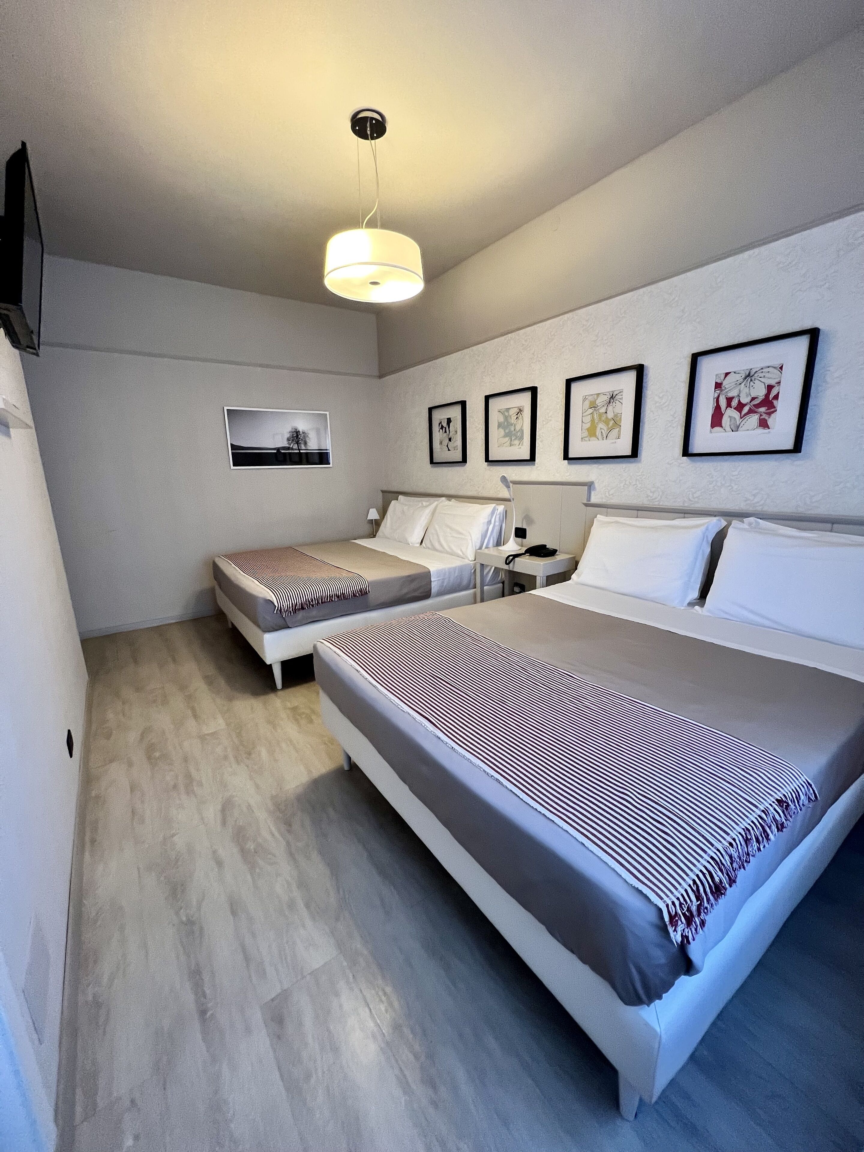 triple room | frette italian sheets, minibar, in-room safe, desk