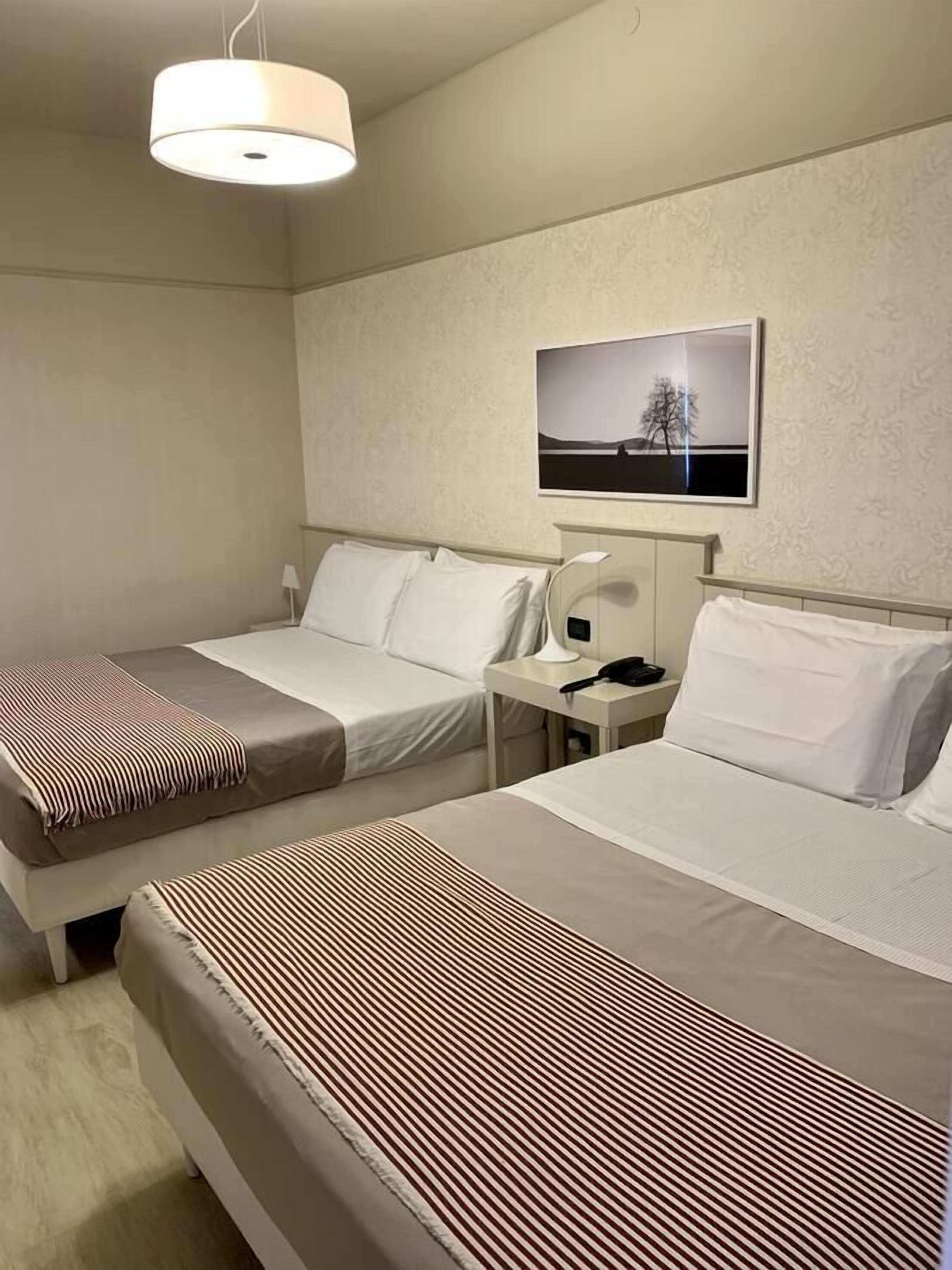 Quadruple Room | Frette Italian sheets, minibar, in-room safe, desk