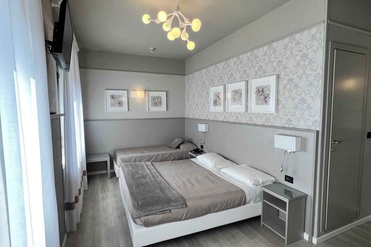 triple room | frette italian sheets, minibar, in-room safe, desk