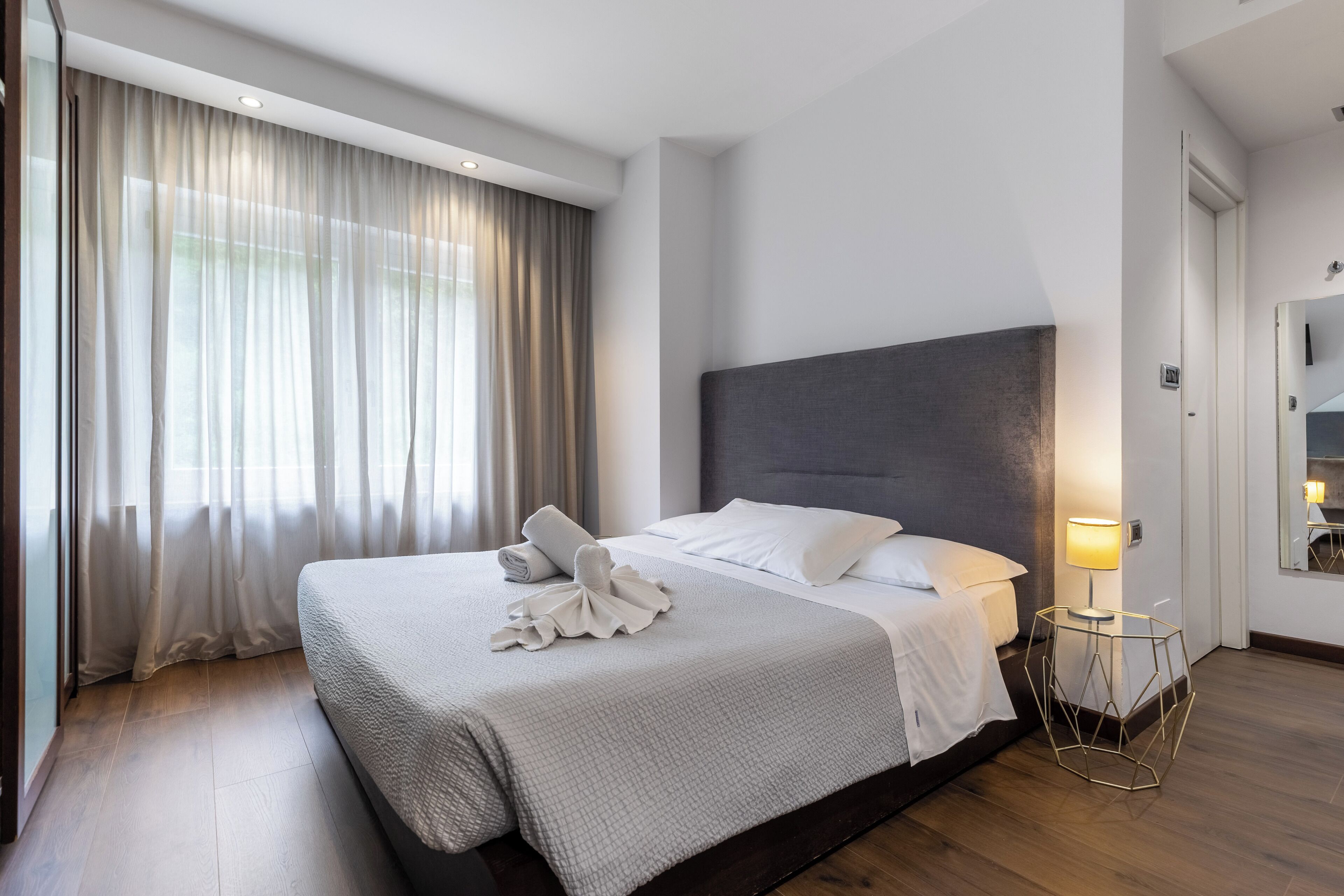 premium bedding, down duvets, memory-foam beds, minibar