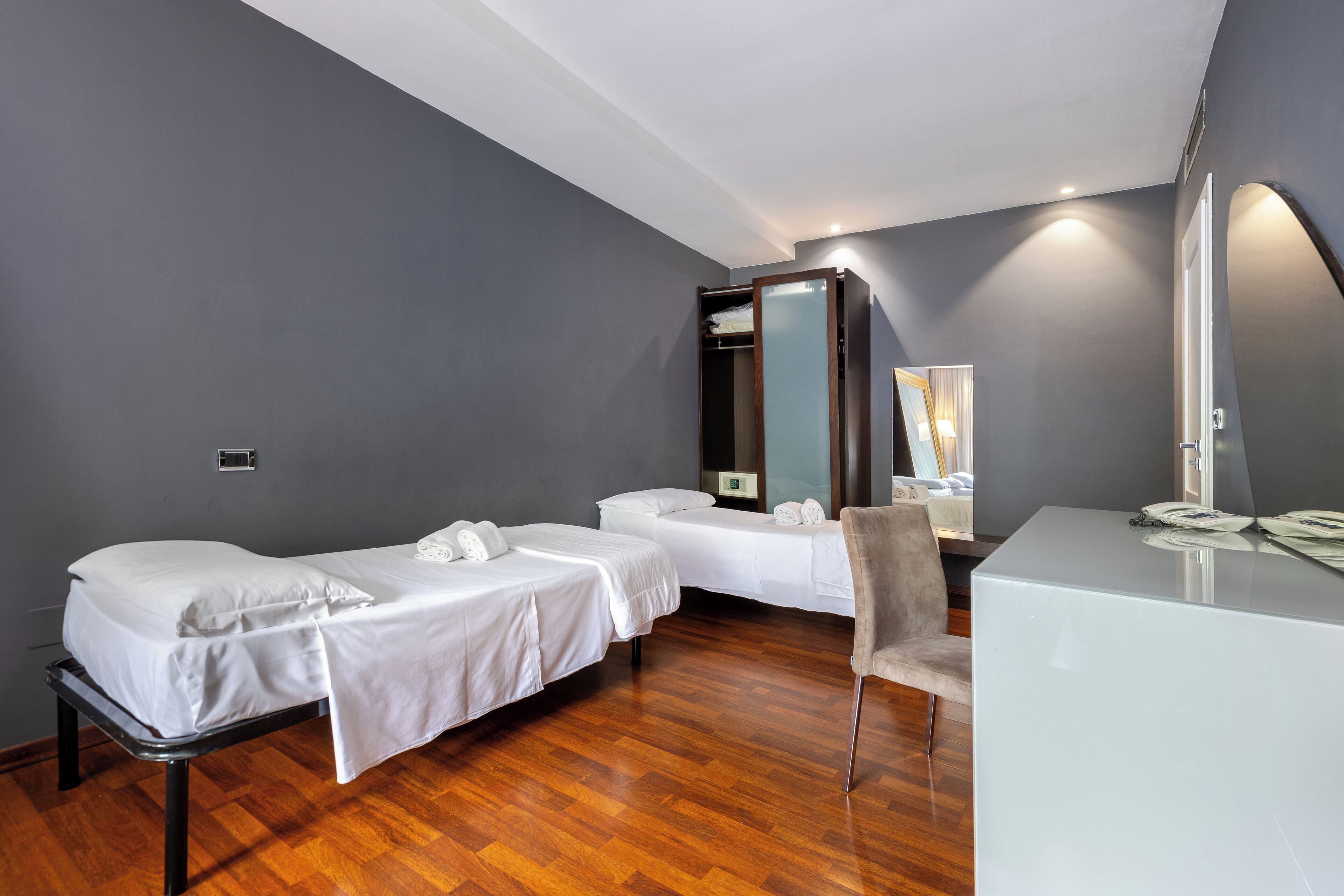 quadruple room | premium bedding, down duvets, memory-foam beds, minibar