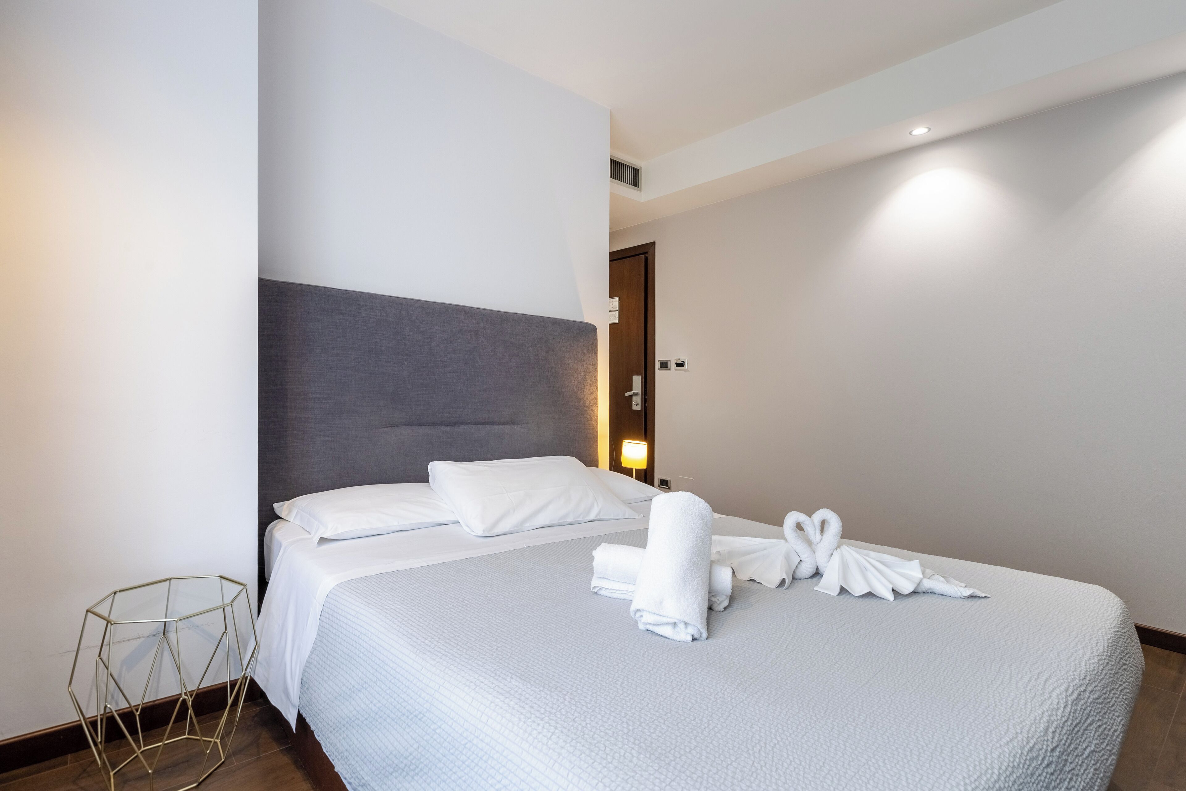 premium bedding, down duvets, memory-foam beds, minibar