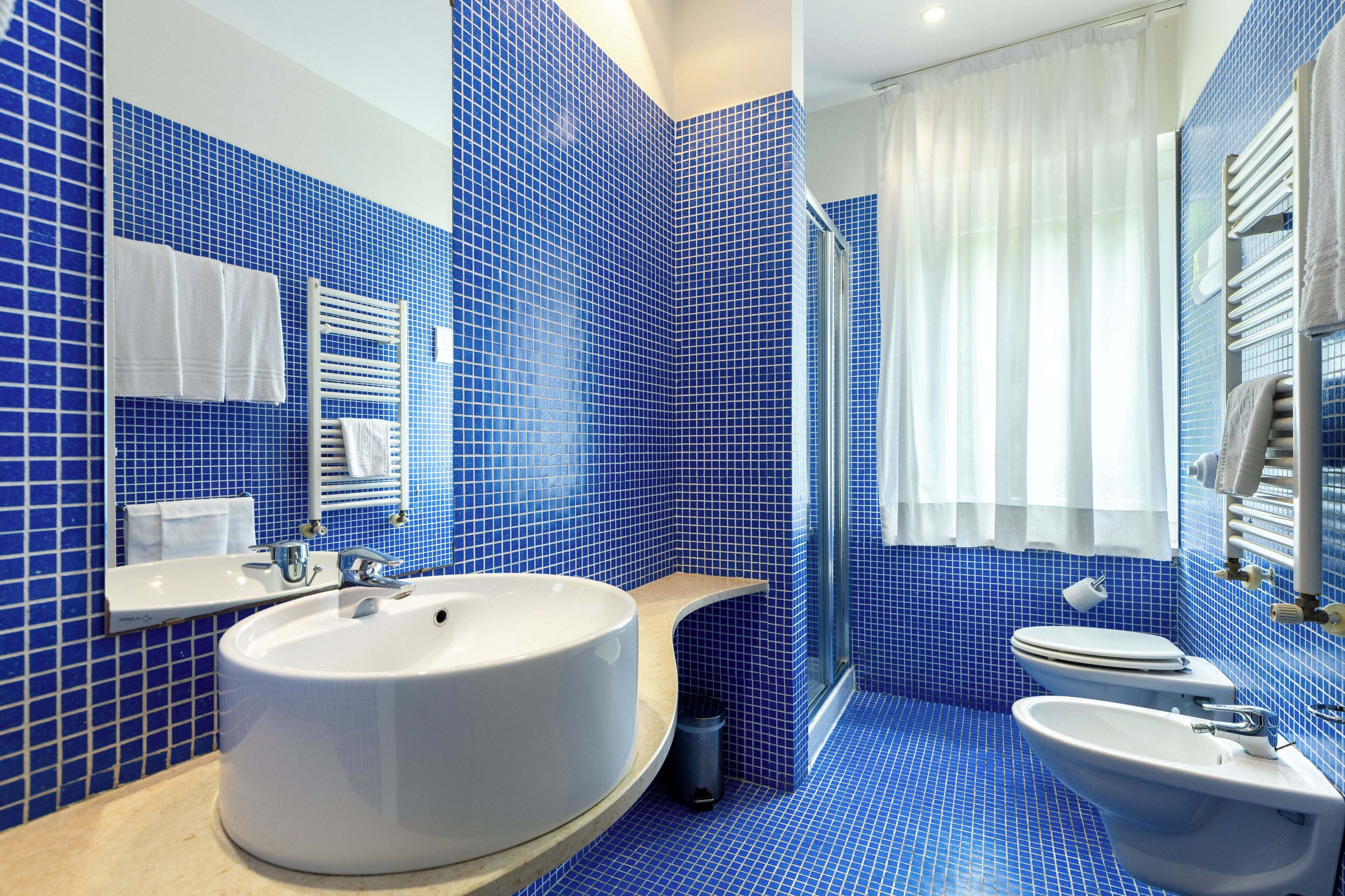 free toiletries, hair dryer, bidet, towels