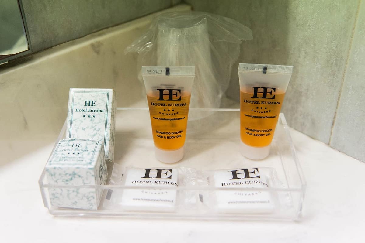 shower, hair dryer, slippers, bidet