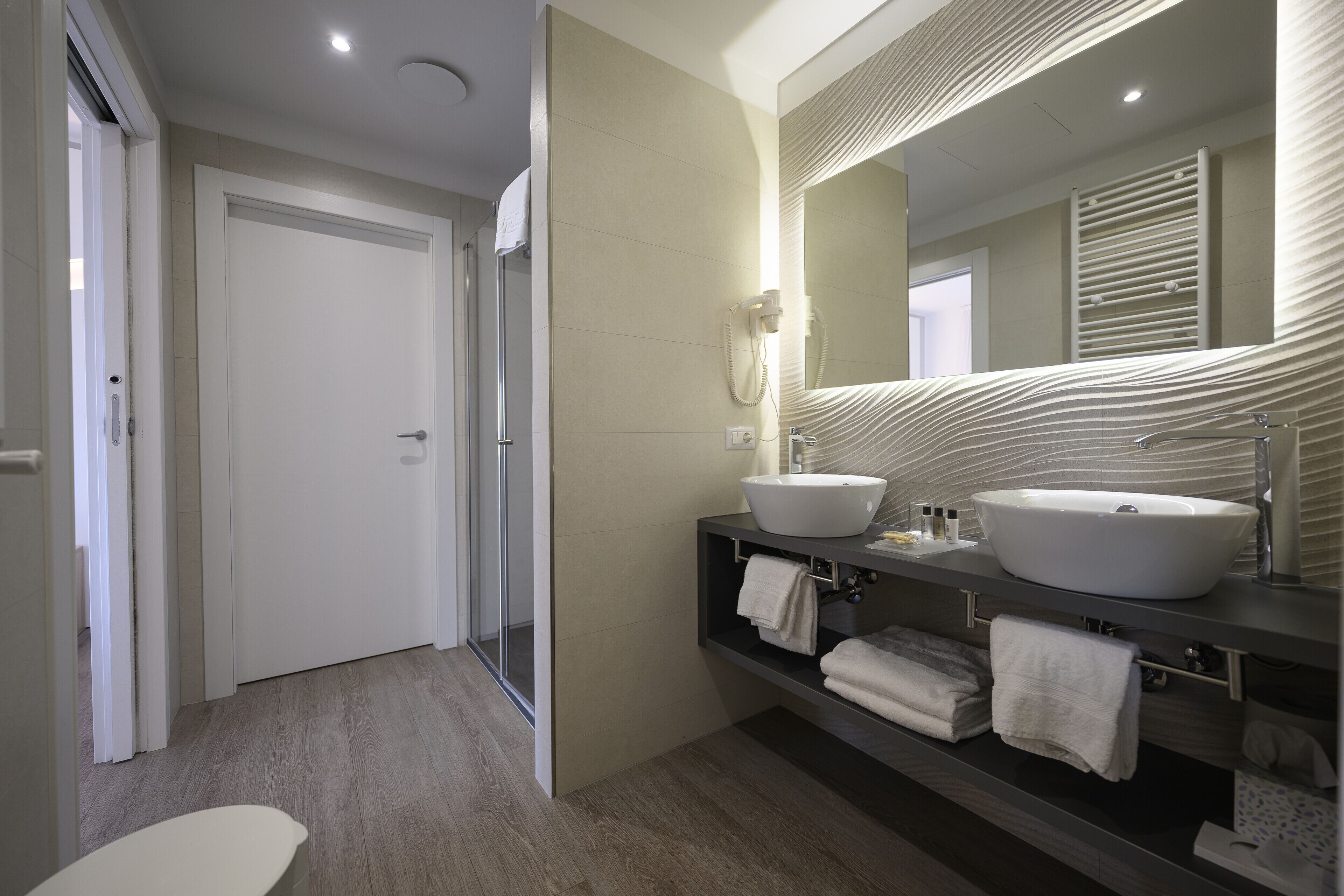 suite | bathroom | hair dryer, towels