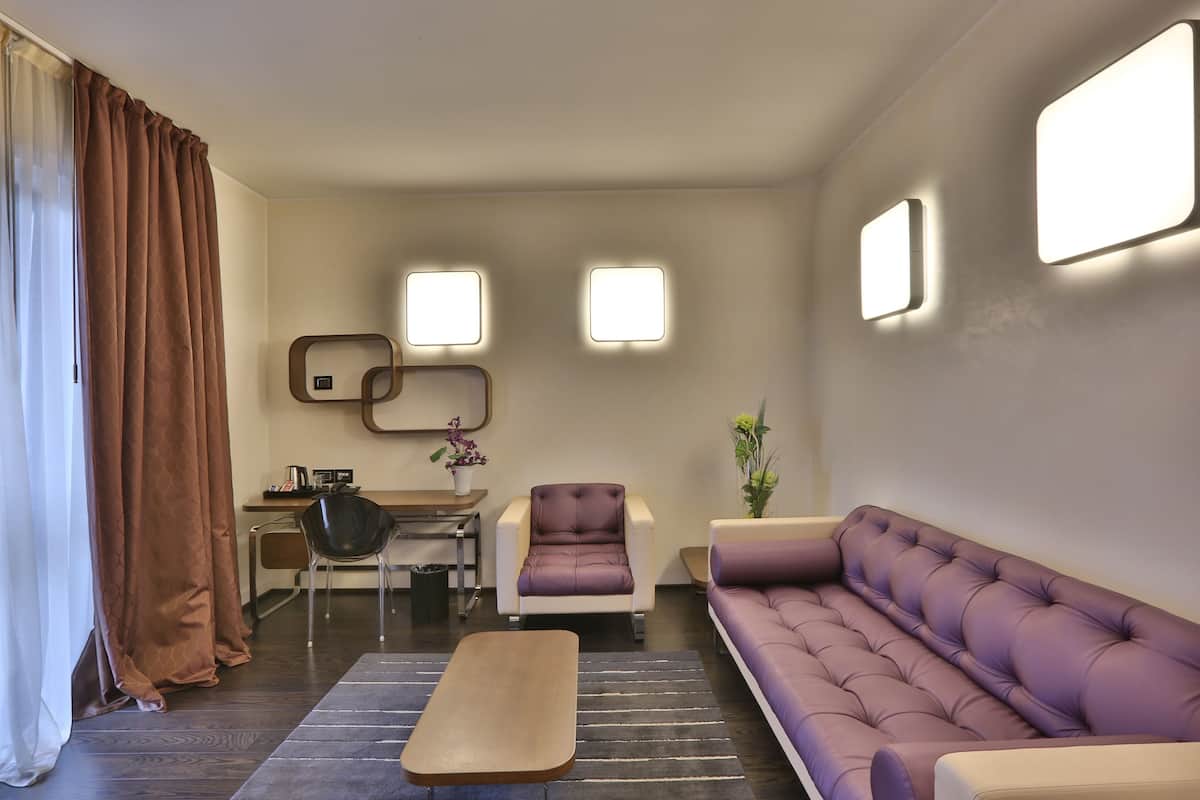 Superior suite | Hypoallergeen beddengoed, Select Comfort-bedden, een minibar