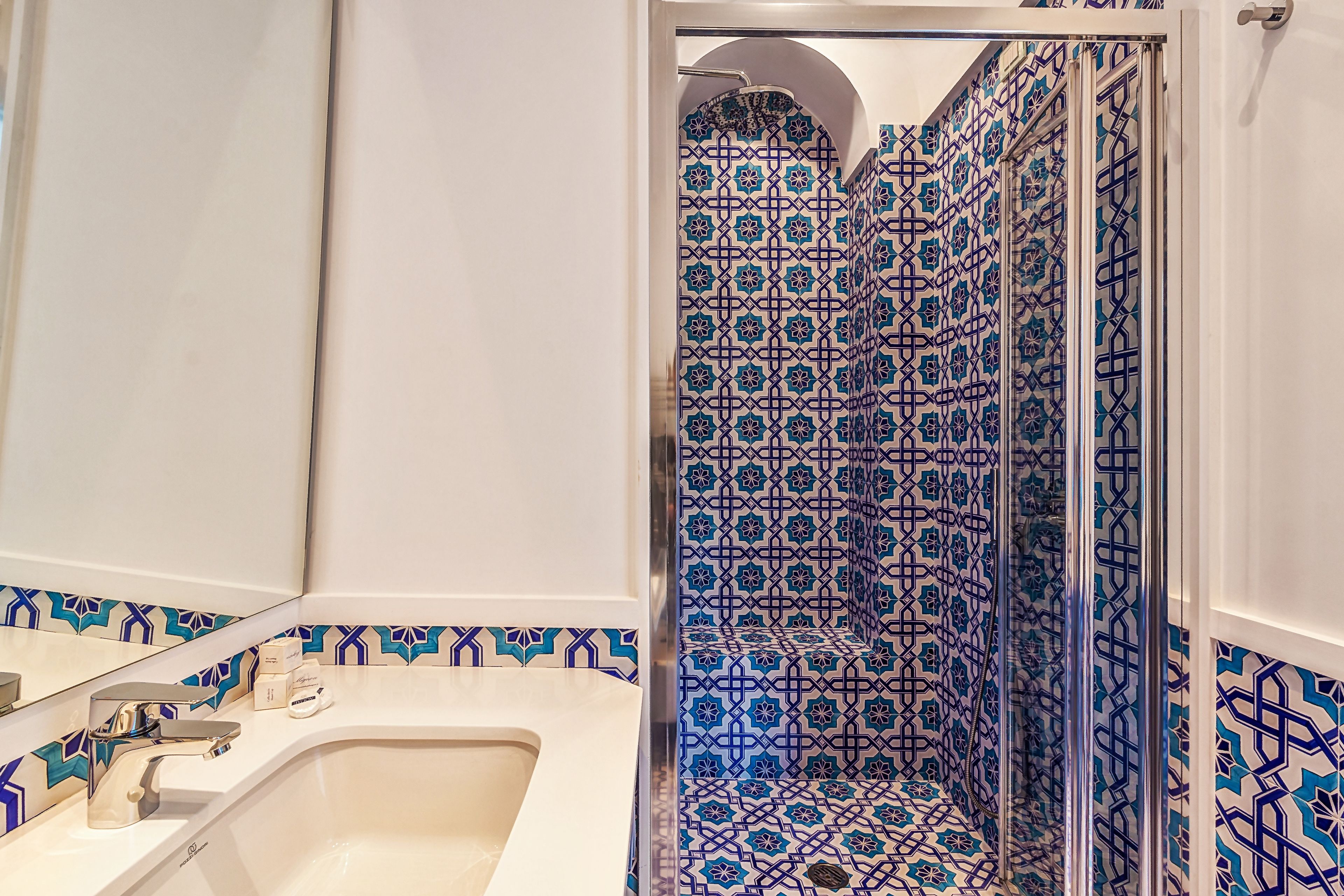 deluxe double room | bathroom | shower, hair dryer, bidet, towels