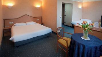 Standard Triple Room | Frette Italian sheets, hypo-allergenic bedding, down comforters, minibar