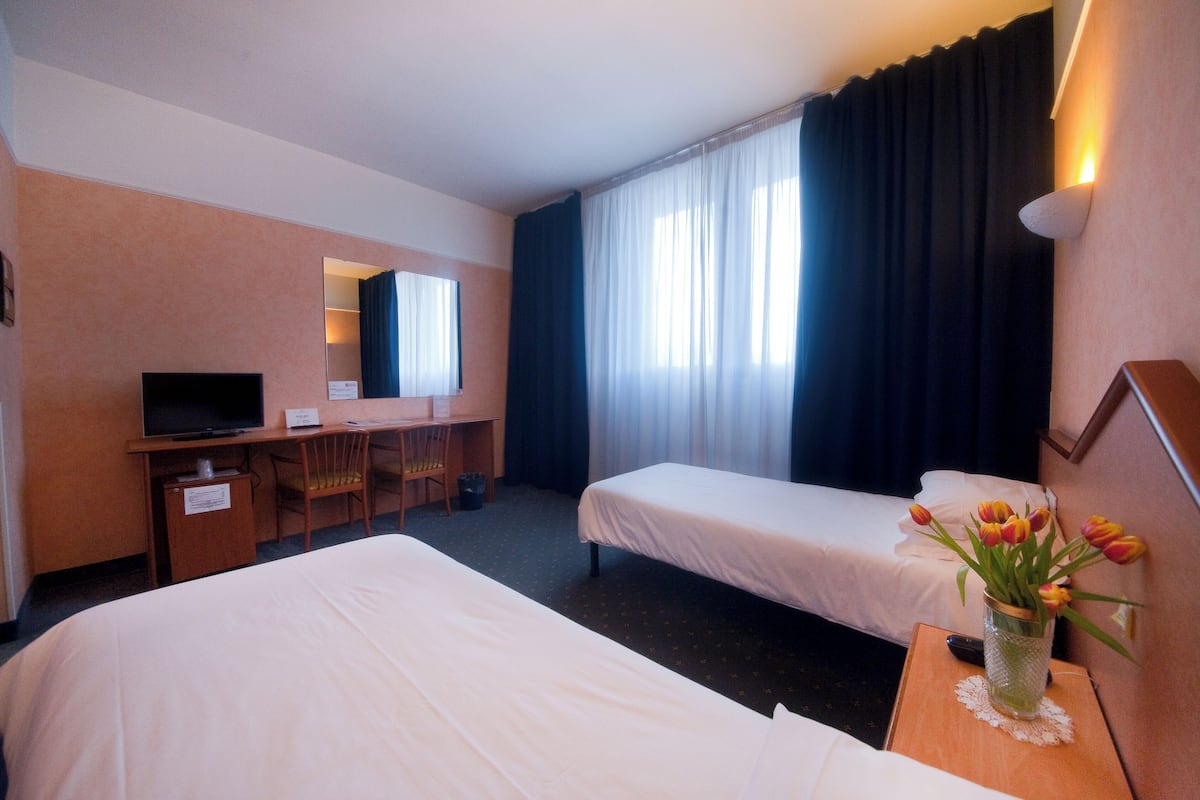 Dobbelt- eller tomannsrom – standard | Italienske Frette-laken, allergitestet sengetøy, dundyner og minibar