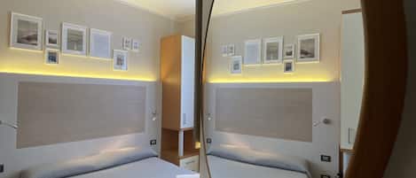 Double or Twin Room | Desk, blackout drapes, iron/ironing board, free WiFi