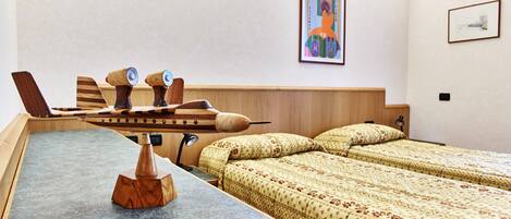 Sábanas italianas Frette, camas Select Comfort y escritorio