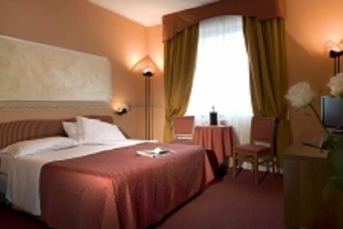 superior triple room | in-room safe, desk, blackout curtains, soundproofing