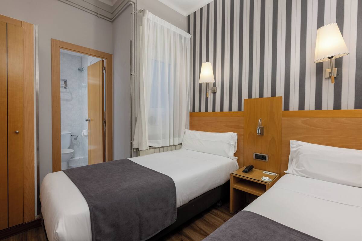 Sistema de insonorización, wifi gratis, ropa de cama