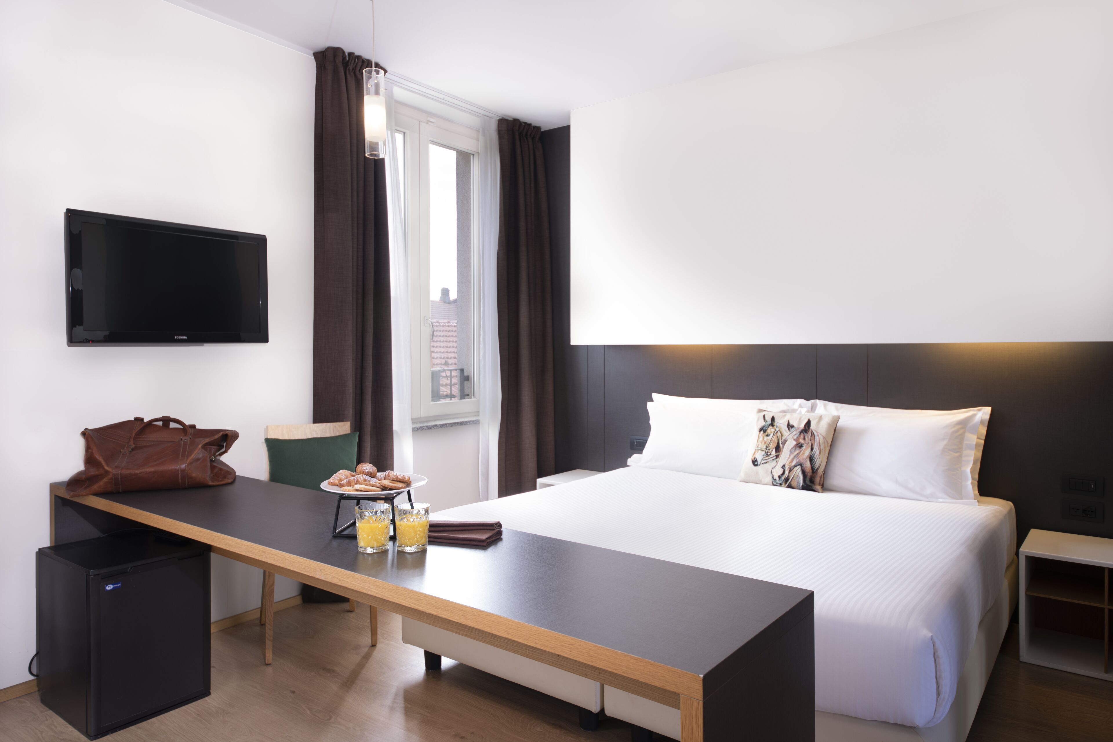 quadruple room | pillow-top beds, minibar, in-room safe, desk