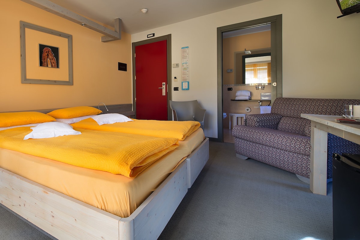 Ropa de cama de alta calidad y minibar