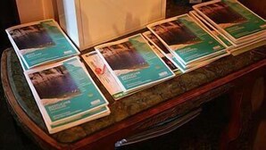 A countertop with several brochures or magazines spread out. - Hotel Fernanda (Rapallo)