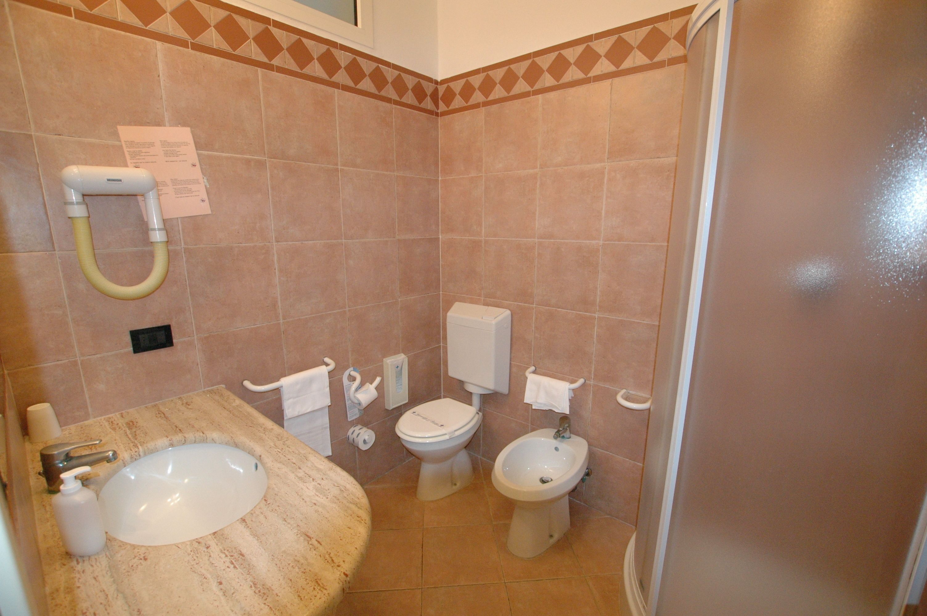 classic double or twin room | bathroom | shower, hair dryer, bidet, towels