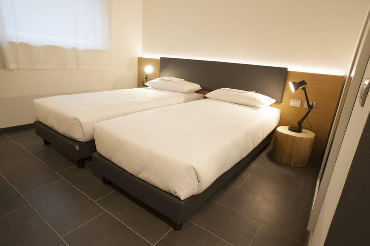 family room, 2 bedrooms, connecting rooms | minibar, in-room safe, desk, blackout curtains