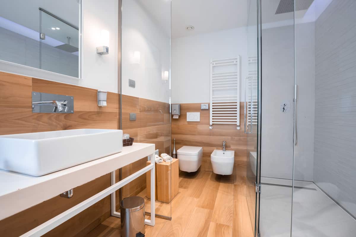 junior suite | bathroom | shower, rainfall showerhead, free toiletries, slippers