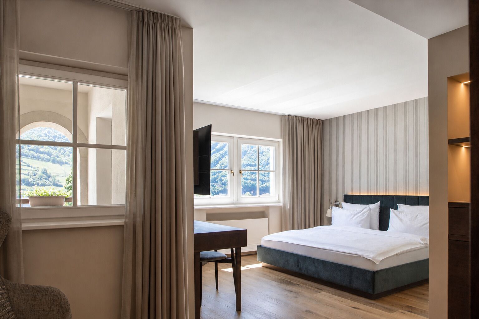 Junior Suite, Garden View | Premium bedding, minibar, in-room safe, desk