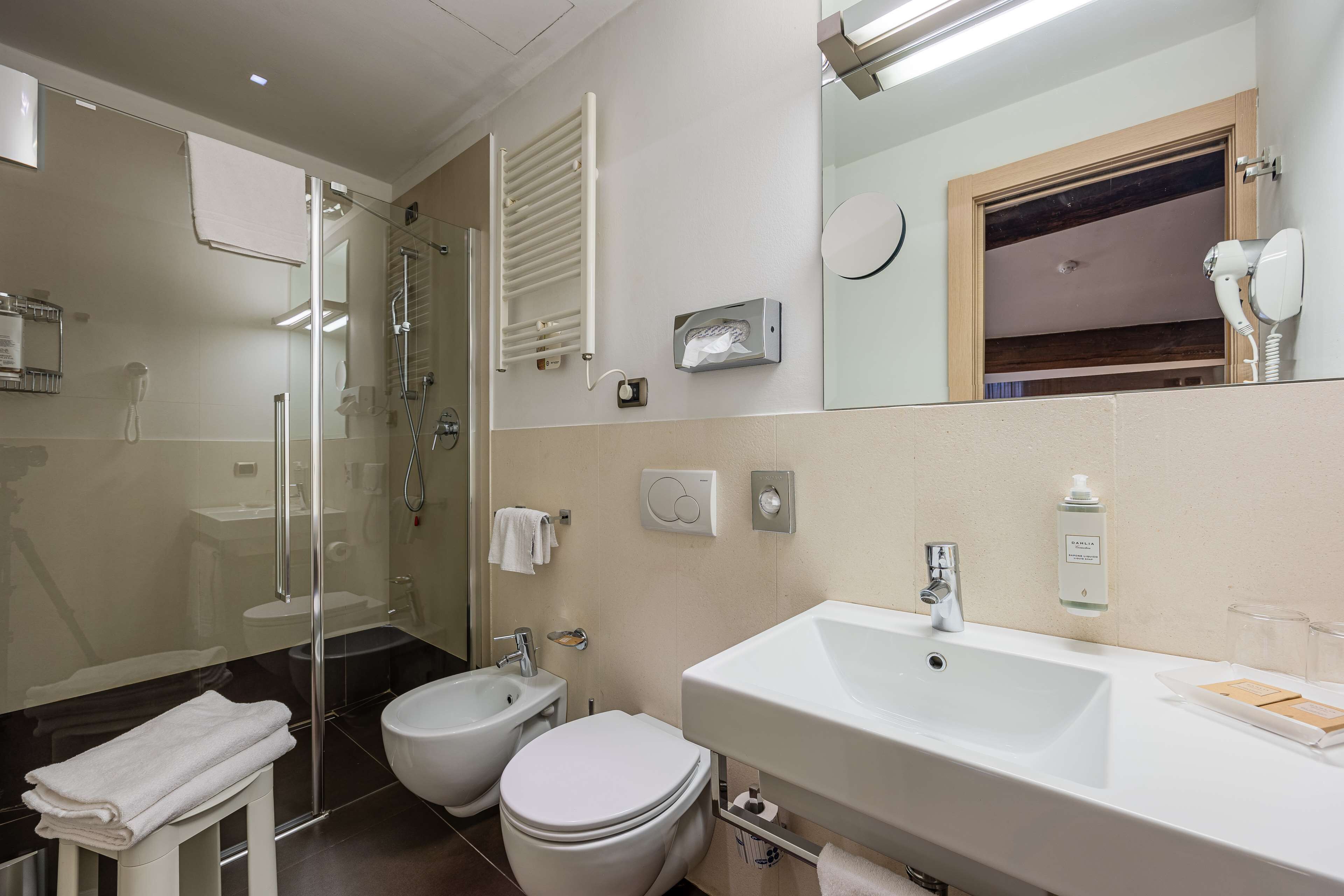 superior room, 1 king bed | bathroom | free toiletries, hair dryer, bidet, towels