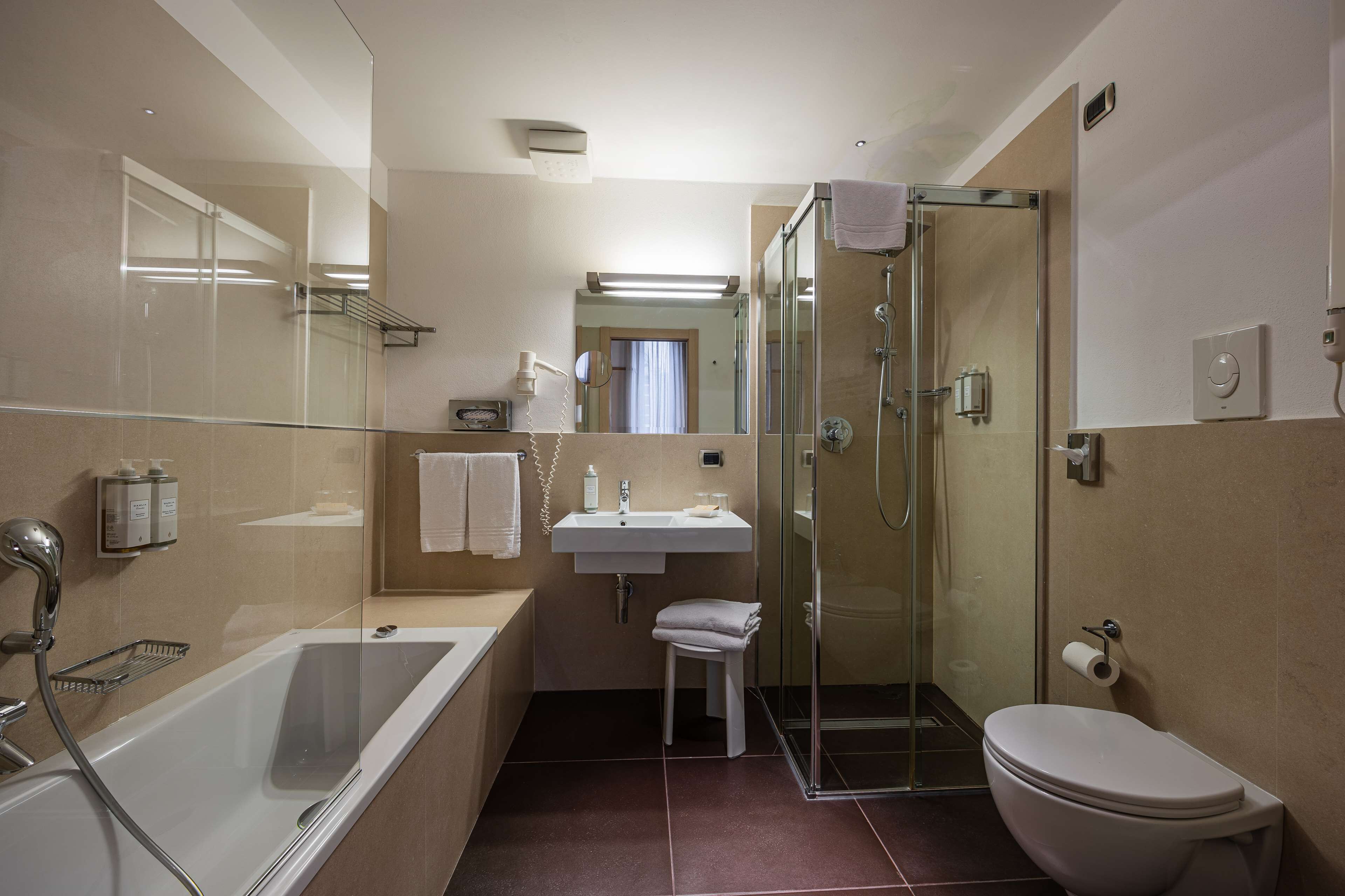 junior suite, 1 king bed (living room) | bathroom | free toiletries, hair dryer, bidet, towels