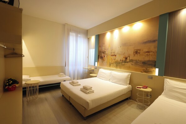 Quadruple Room | Down duvets, pillow-top beds, blackout curtains, iron/ironing board