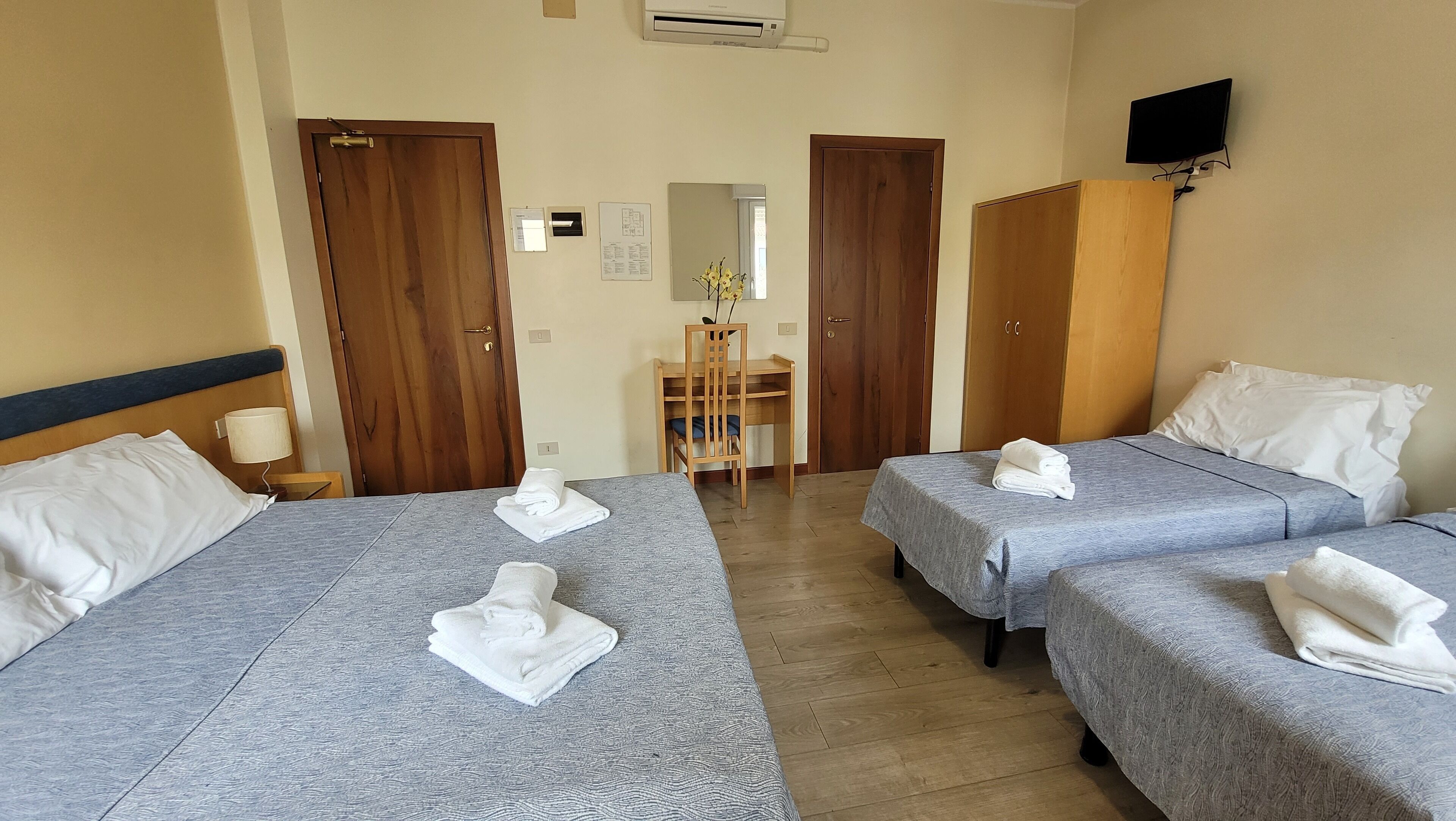 economy quadruple room | 1 bedroom, frette italian sheets, select comfort beds, desk