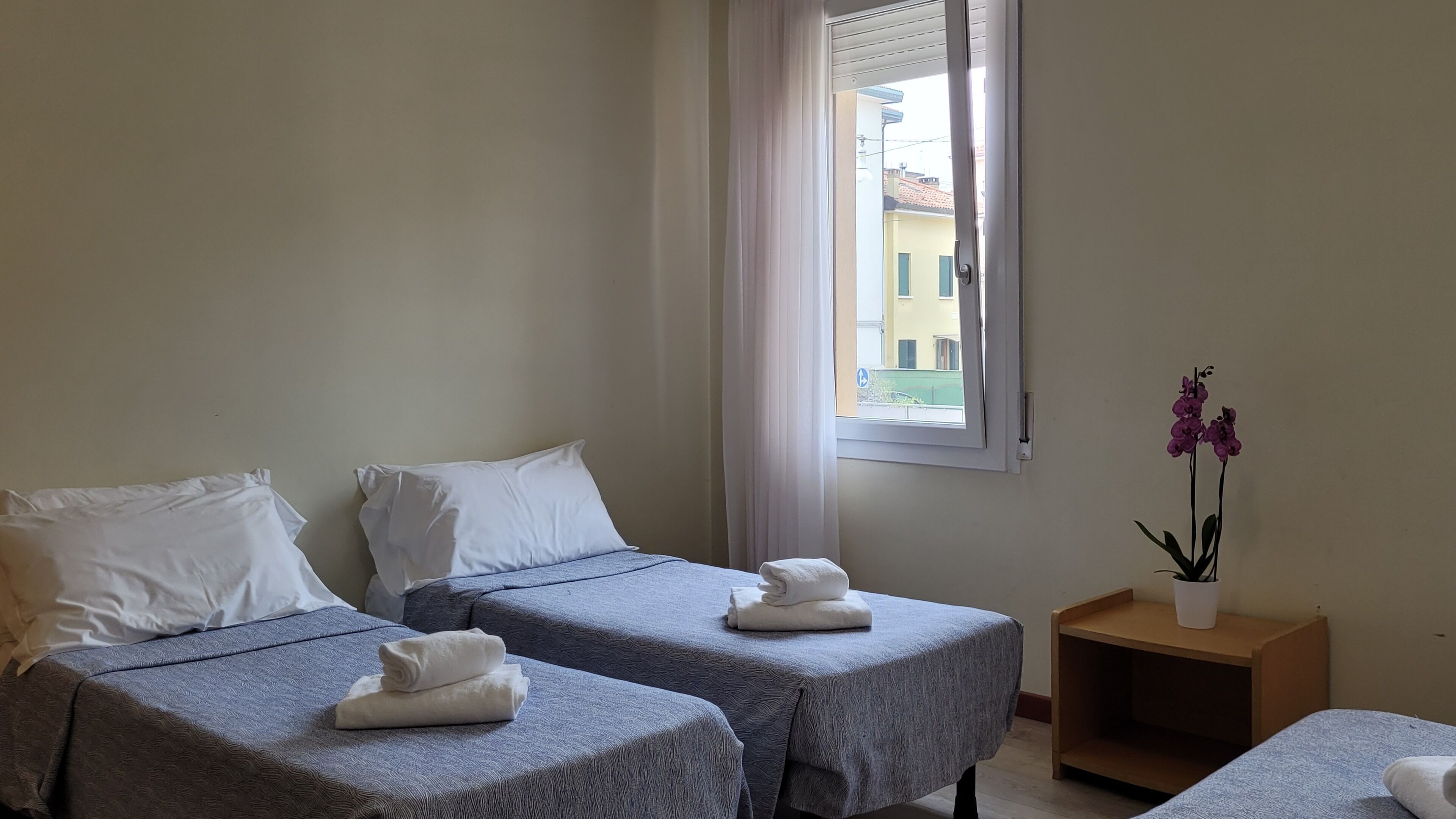 economy quadruple room | 1 bedroom, frette italian sheets, select comfort beds, desk