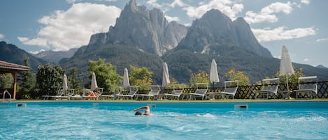 Indoor pool, seasonal outdoor pool, pool umbrellas, sun loungers