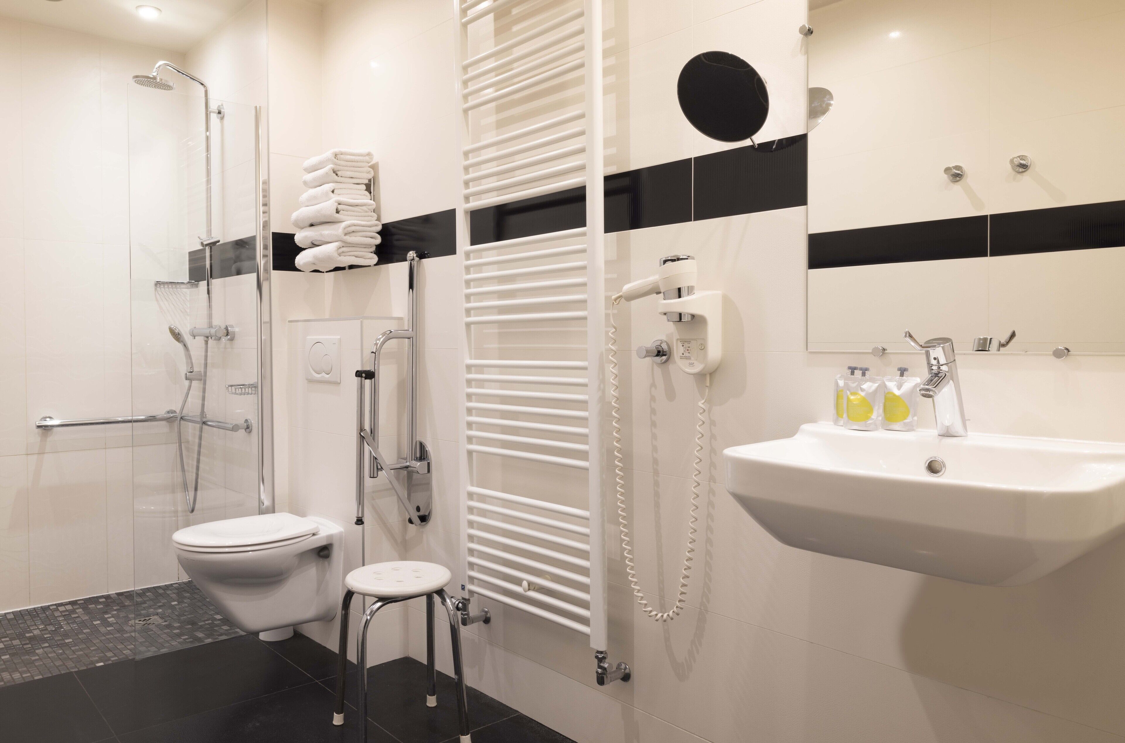 shower, free toiletries, hair dryer, towels