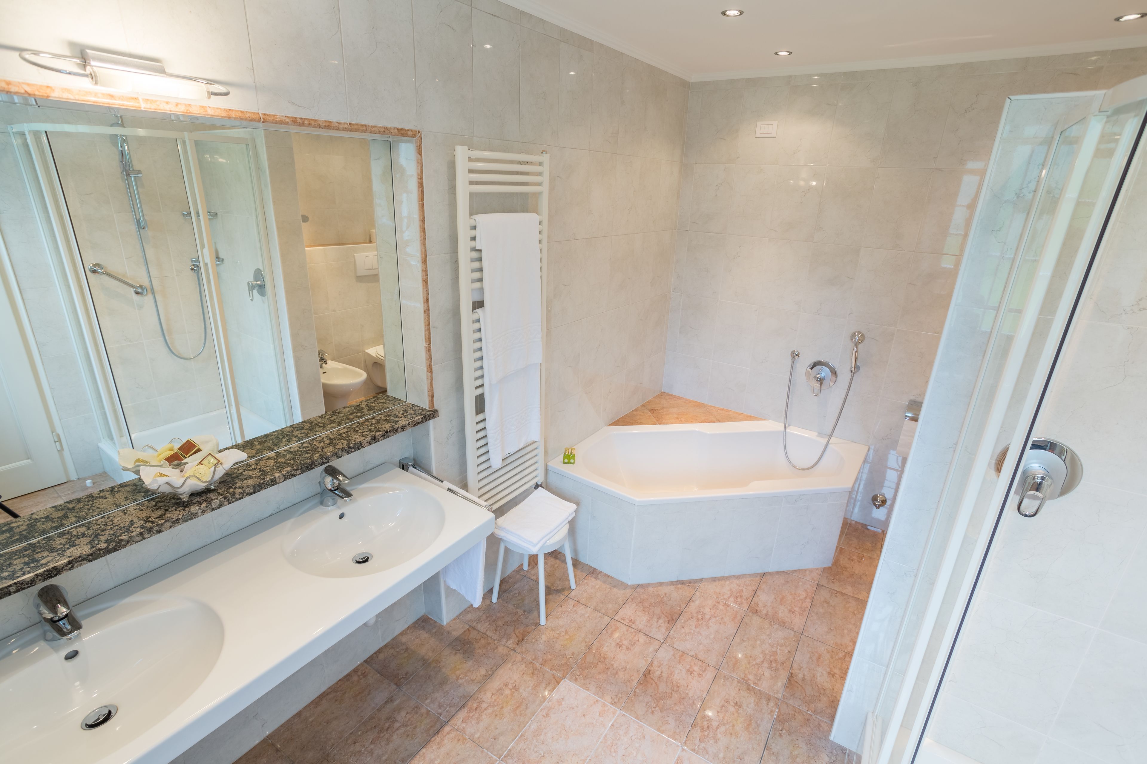 junior suite | bathroom | free toiletries, hair dryer, bathrobes, slippers