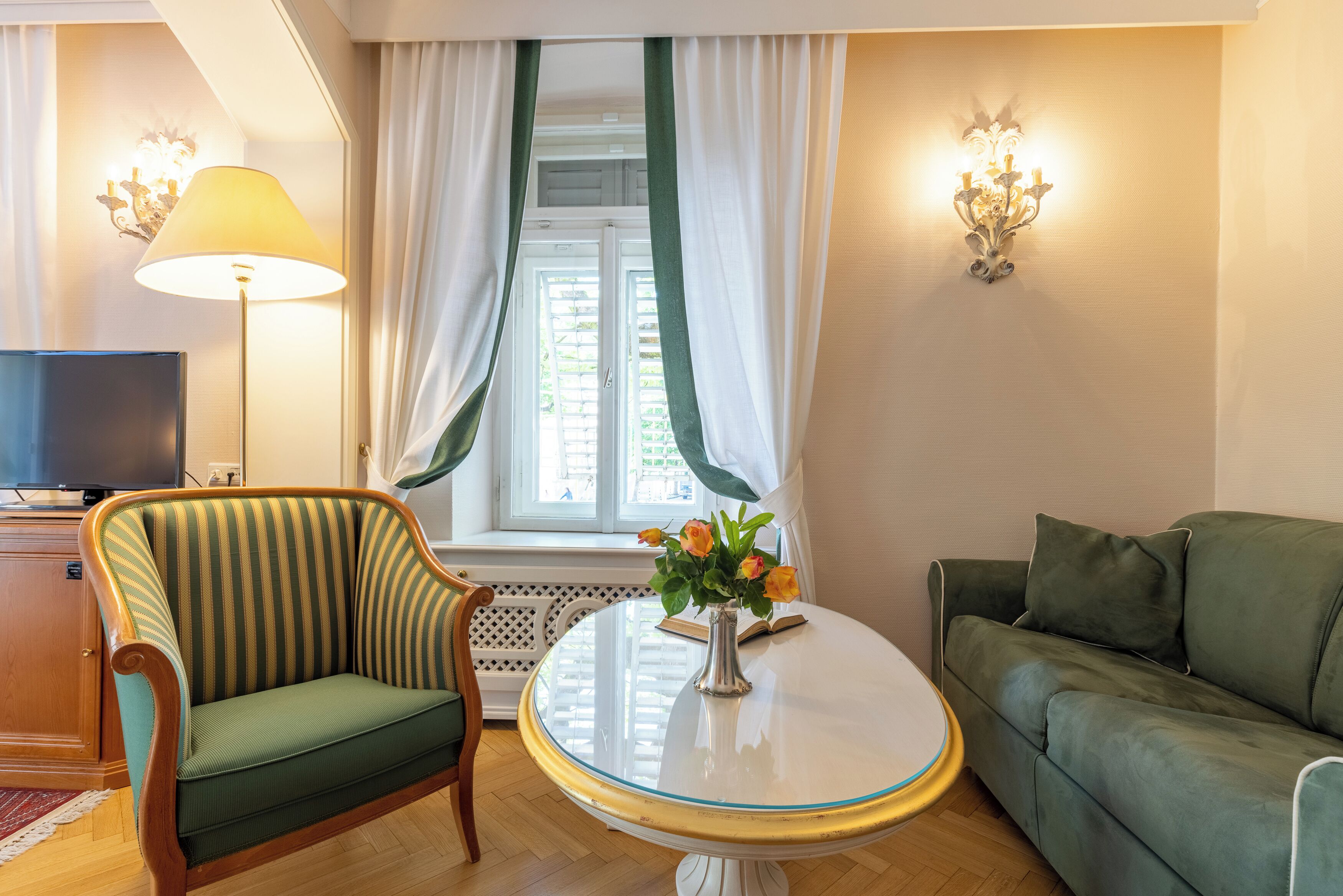 junior suite, annex building | living area | flat-screen tv