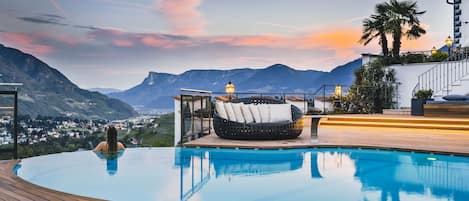 Indoor pool, seasonal outdoor pool, pool umbrellas, sun loungers