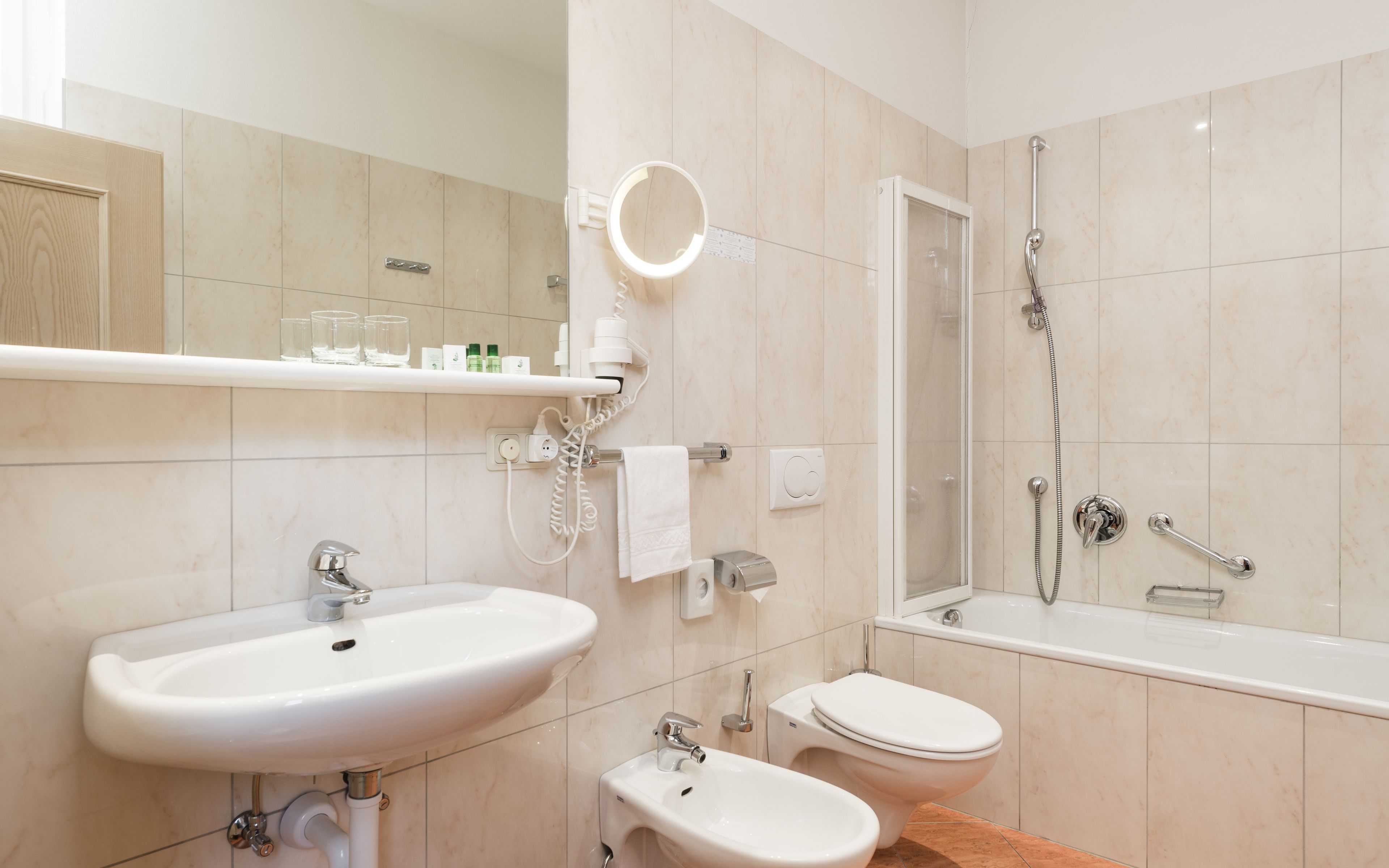 hair dryer, slippers, towels