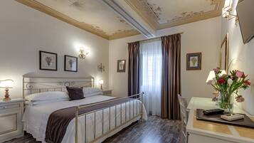 Classic Double Room, Garden View | Minibar, in-room safe, individually decorated, individually furnished