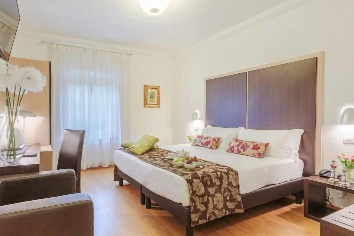Select Comfort beds, minibar, in-room safe, desk
