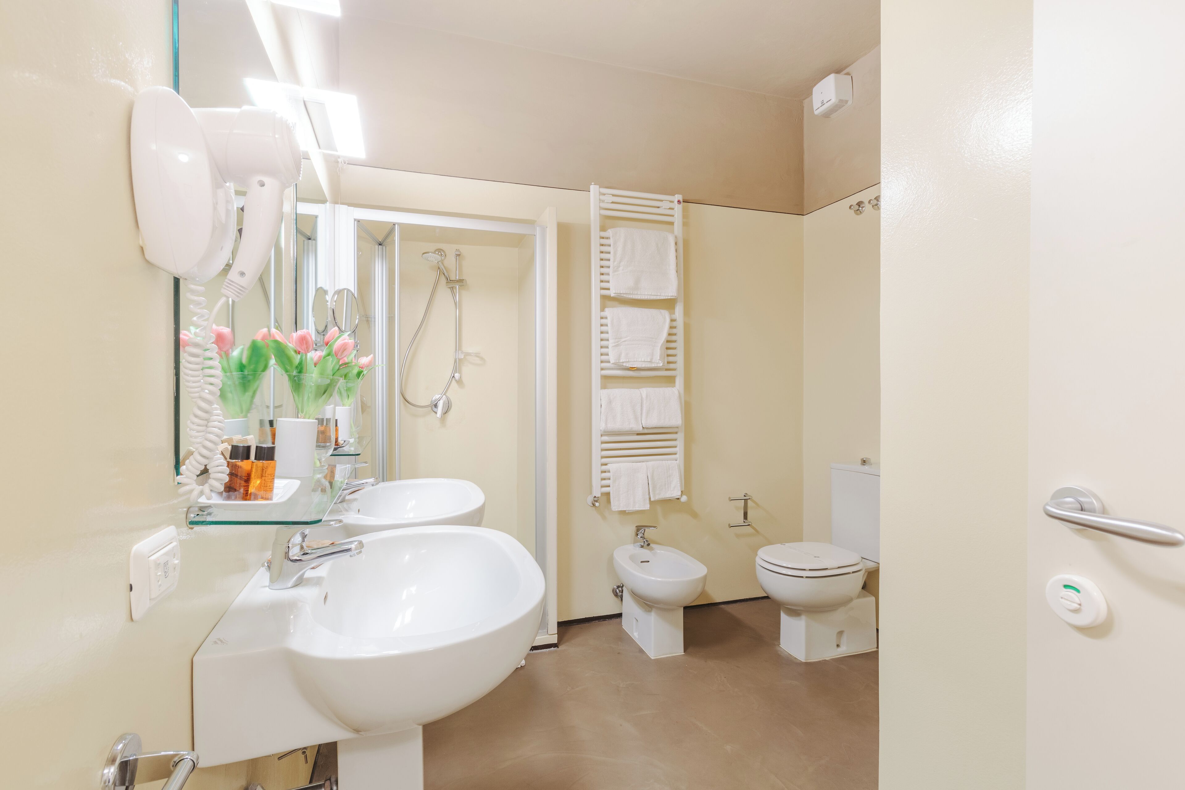 quadruple room | bathroom | shower, rainfall showerhead, free toiletries, hair dryer