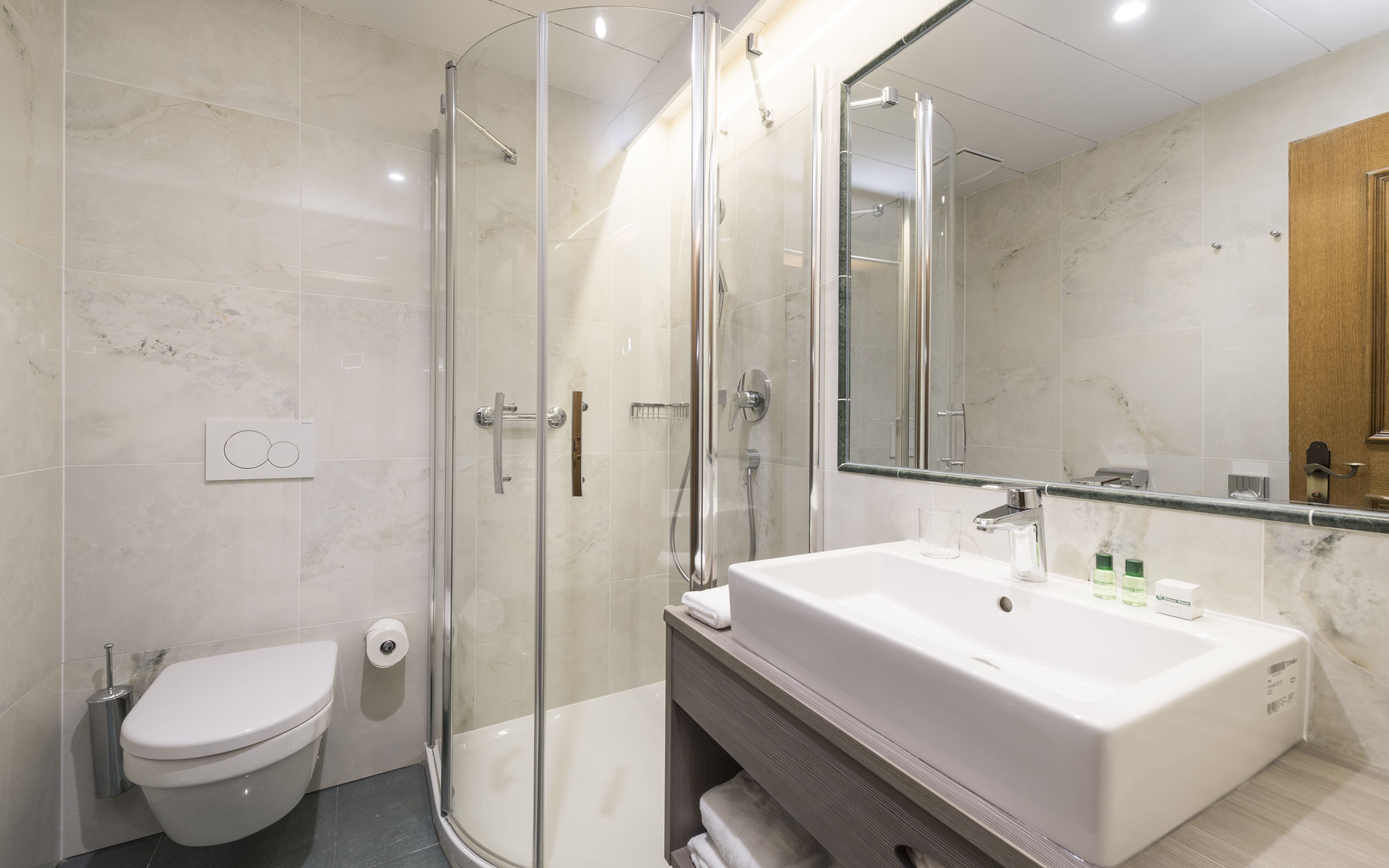 comfort single room | bathroom | hair dryer, slippers, towels