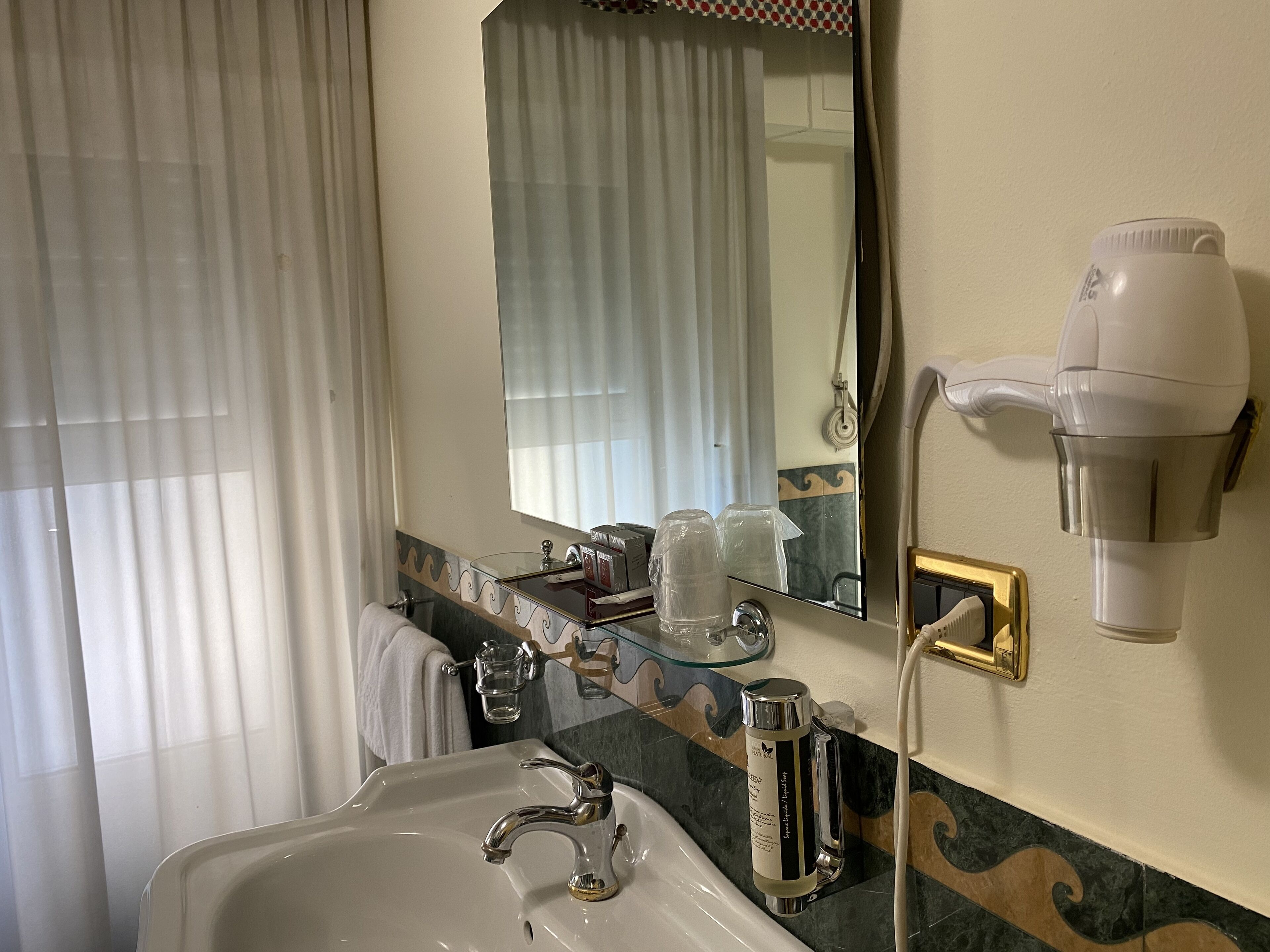 executive double room, lake view | bathroom | combined shower/bathtub, free toiletries, hair dryer, slippers