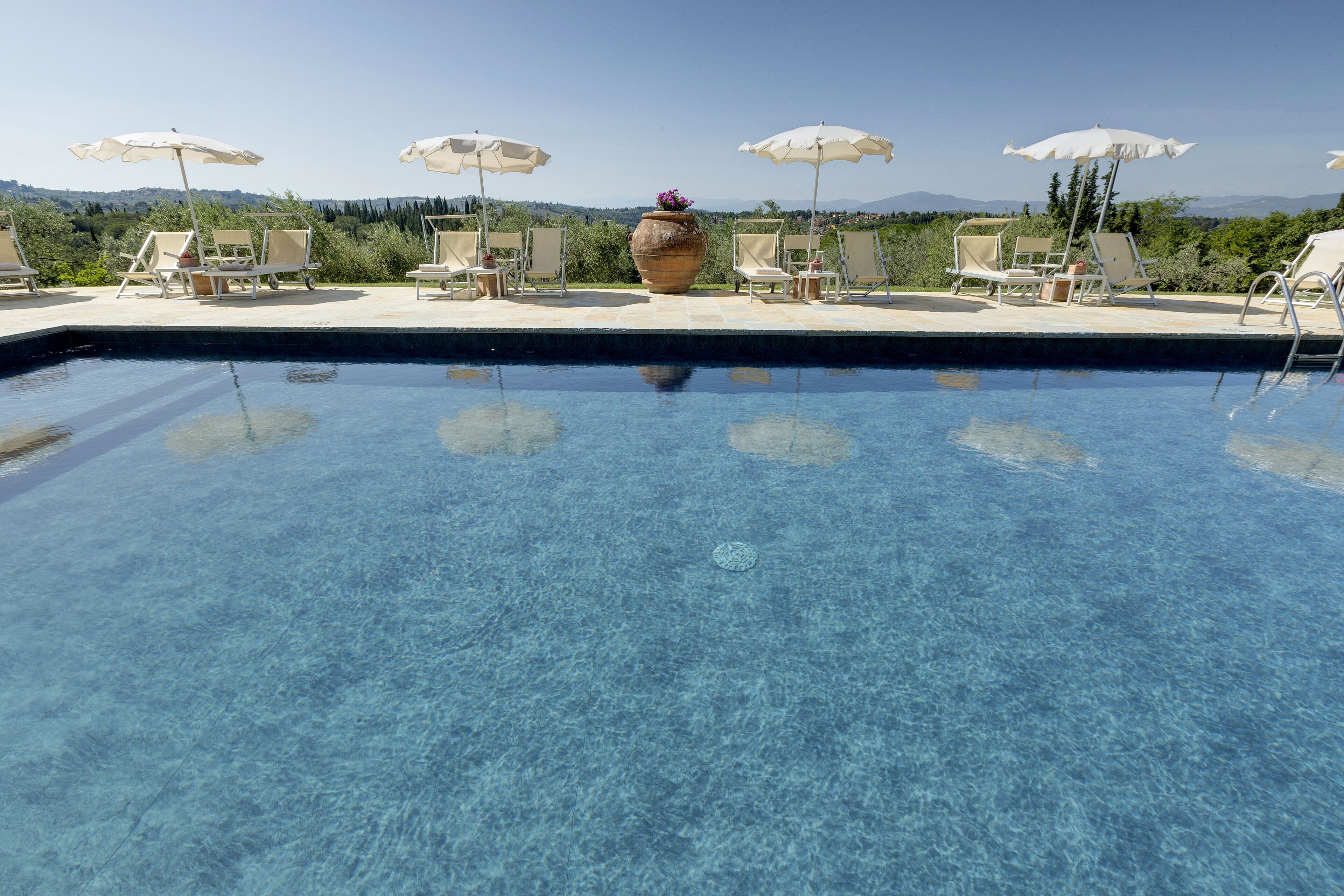 Outdoor pool, pool umbrellas, pool loungers