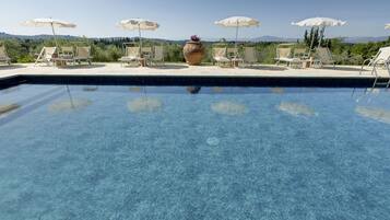Outdoor pool, pool umbrellas, pool loungers