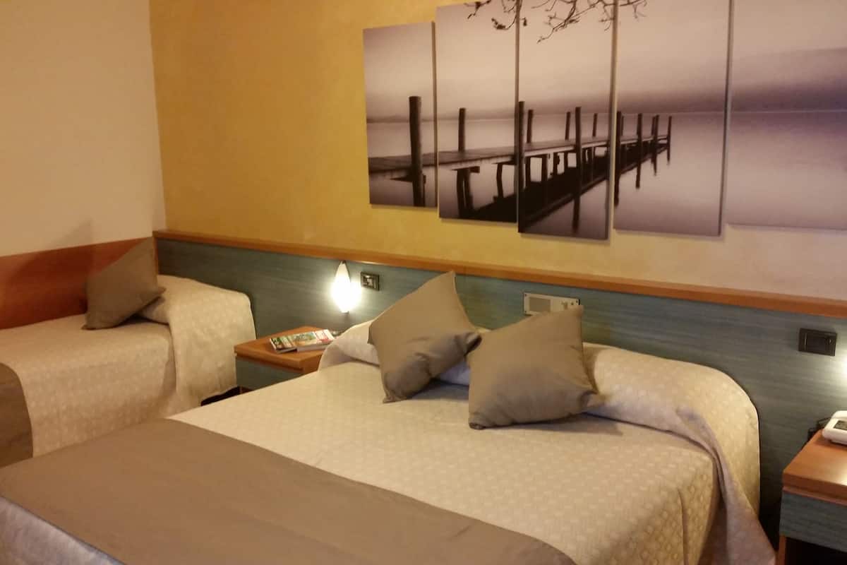 triple room | 1 bedroom, frette italian sheets, in-room safe, desk