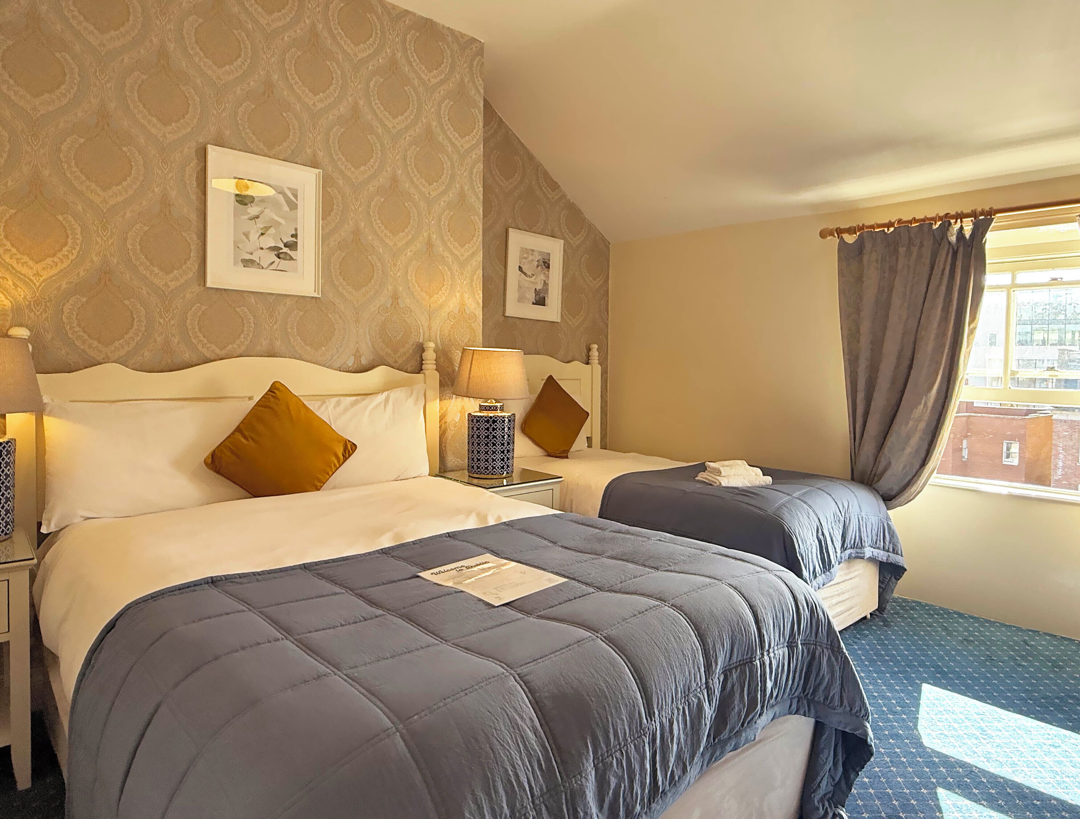 Down duvets, desk, blackout curtains, iron/ironing board