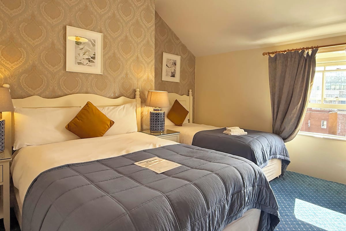 Down duvets, desk, blackout curtains, iron/ironing board